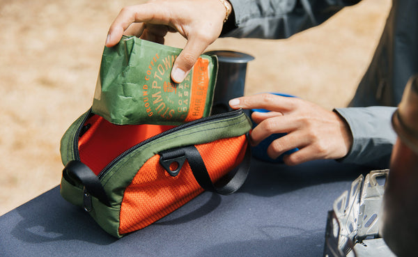 Putting a bag of coffee in the Grab Bag.